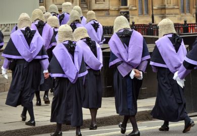 British judges in traditional 'full bottomed' wigs and robes process in London at the start of the legal year