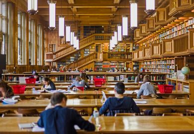 Students who studying inside the library of the university of Leuven, Belgium, old from the years 1425.  Students who studying inside the library of the university of Leuven, Belgium, old from the years 1425.