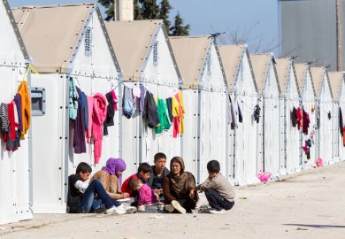 Refugees living in tents Refugees living in tents