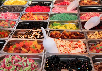 Pick and mix sweets displayed in a stall Pick and mix sweets displayed in a stall