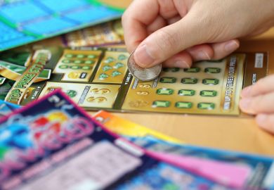 Woman scratching lottery ticket called Monopoly