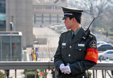 Chinese policeman guards in Beijing, China. Chinese policeman guards in Beijing, China.