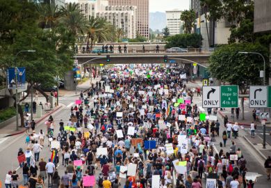  Thousands of Angelenos marched through the streets of Downtown Los Angeles in protest of president-elect Donald Trump.
