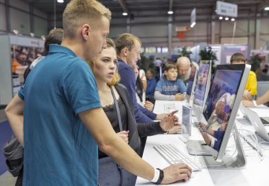  Unrecognized people visit Apple, American multinational technology company booth during CEE 2016.