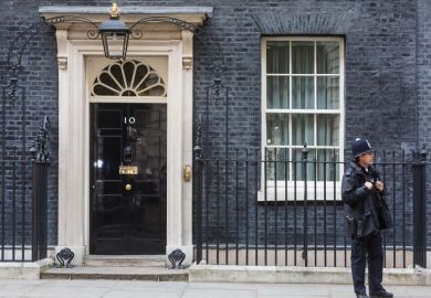 A police officer outside No.10 Downing Street, London