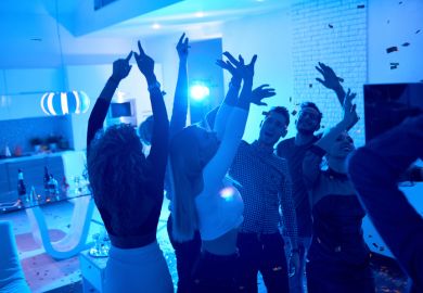 People at a house party People at a house party