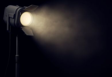 spotlight scrutiny inquisition interrogation stage light