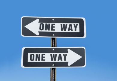 'One way' signs pointing in two directions