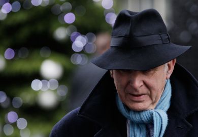 Vince Cable in a fedora hat