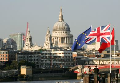 St Paul's with EU, UK flags