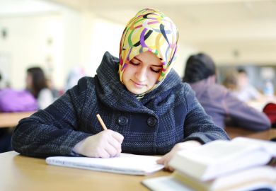 Student with head scarf