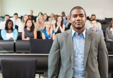 Black academic in lecture theatre