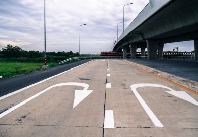 U-turn sign painted on road U-turn sign painted on road