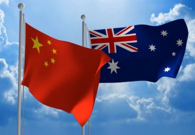 Chinese and Australian flags flying