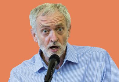 Jeremy Corbyn speaking into microphone Jeremy Corbyn speaking into microphone
