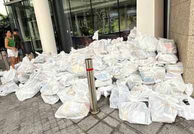 Books bagged for disposal outside Yale-NUS College