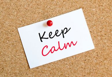 'Keep calm' note pinned to corkboard 'Keep calm' note pinned to corkboard