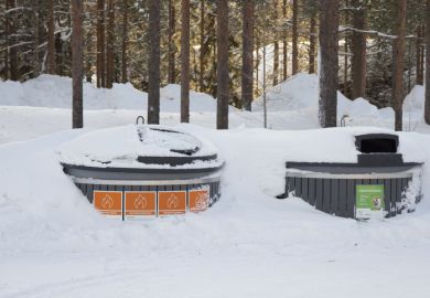 Finland public trash covered by snow Kittila, Finland - Feb 23, 2020 Finland public trash covered by snow.