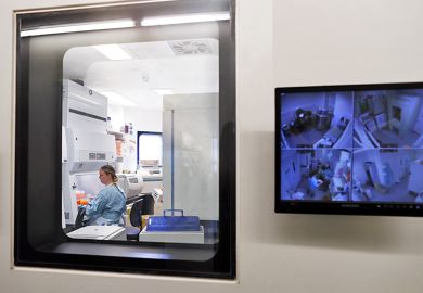 Screen showing cctv outside a laboratory door. To illustrate the need for ‘tougher’ research security measures and more resources to guard against espionage risks. Screen showing cctv outside a laboratory door. To illustrate the need for ‘tougher’ research security measures and more resources to guard against espionage risks.