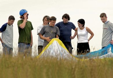People learning to paraglide