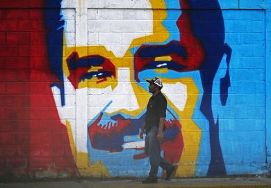 A man walks past a mural depicting Venezuelan President Nicolas Maduro in Caracas on January 3, 2026. A man walks past a mural depicting Venezuelan President Nicolas Maduro in Caracas on January 3, 2026.