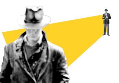 Male academic staring at student from distance Male academic staring at student from distance