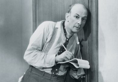 Man eavesdropping and taking notes at door