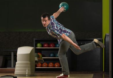Man in dramatic bowling pose Man in dramatic bowling pose
