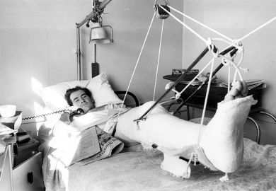 Man making a phonecall while sick in bed