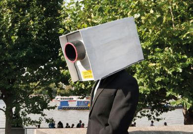 A man with a CCTV camera on his head