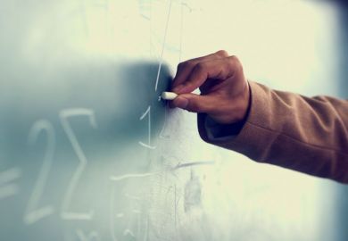Man's hand drawing on blackboard Man's hand drawing on blackboard