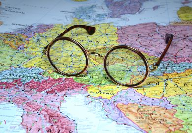 Glasses on map Glasses resting on a map