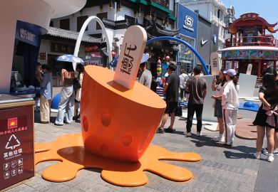 A melting ice cream installation is seen at Shenyang Zhongjie pedestrian street in the summertime on 22 July 2025 in Shenyang, Liaoning Province of China. As an illustration of whether universities can unfreeze China’s graduate job market.