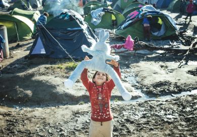 Child playing in refugee camp