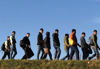 Migrants walking to registration point, Germany