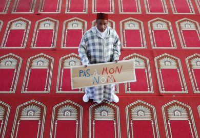 Muslim man holding "Not in my name" placard, Arrahma Mosque, Nantes, France Muslim man holding "Not in my name" placard, Arrahma Mosque, Nantes, France
