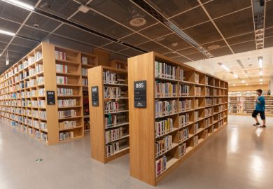 Nanchang, China - July 1, 2021 Readers read in the evening at the Jiangxi Provincial Library