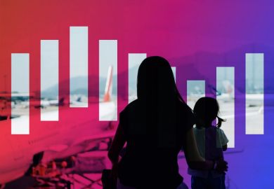 Mother and child watching as aeroplane departs