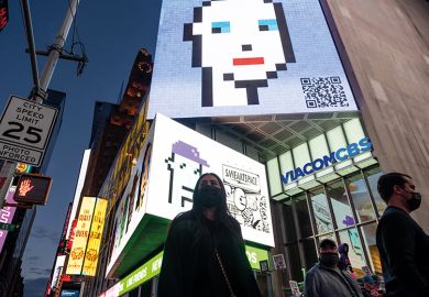 People walk past CryptoPunk non-fungible token (NFT) on a digital billboard in Times Square on May 12, 2021