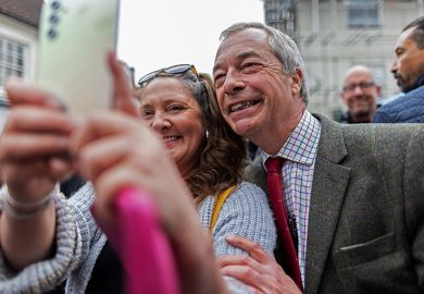 Leader of the Reform Party Nigel Farage poses for a selfie while on a walkabout on 25 April, 2025 in Beverley, England. To illustrate that universities are attempting to woo Reform.