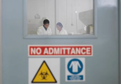 No admittance sign on laboratory door, to illustrate that Trump security crackdown risks undermining US collaboration.