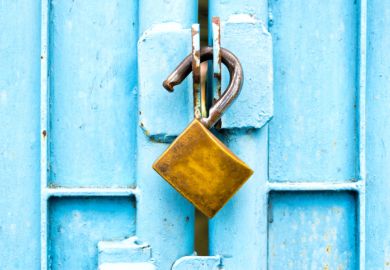 An opened padlock, symbolising open access
