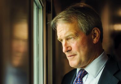 Owen Paterson looking out of window Owen Paterson looking out of window