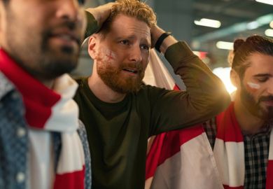 Upset England football fans, illustrating the government's own-goal on international students