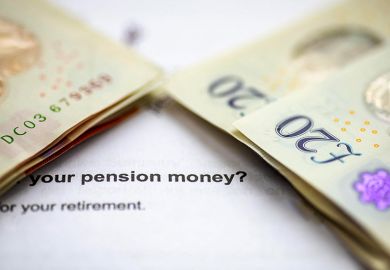 A close up of stacks of pound sterling bank notes on top of a pension planning letter. A close up of stacks of pound sterling bank notes on top of a pension planning letter.