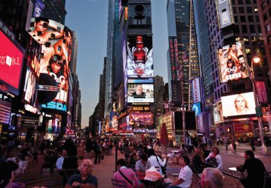 People eating in Times Square, New York City