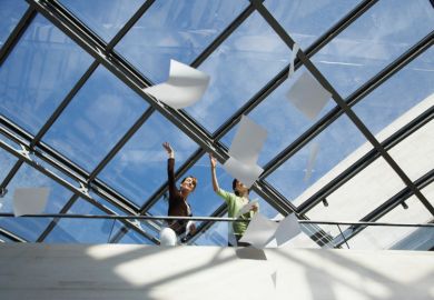 People throwing papers