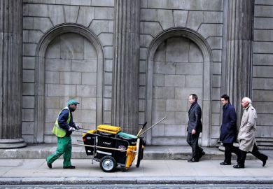 People walking outside Bank of England, London People walking outside Bank of England, London