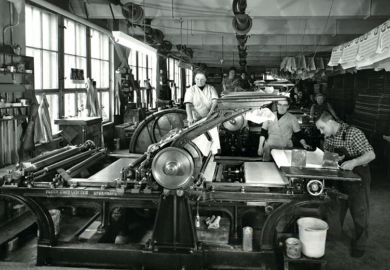 People working on stone printing press, Germany, 1950