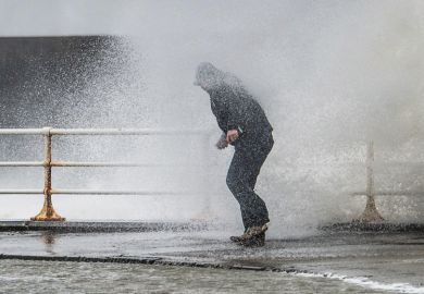 Person caught in spray of wave, Worcester, England